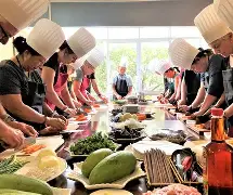 Cooking class participants in aprons